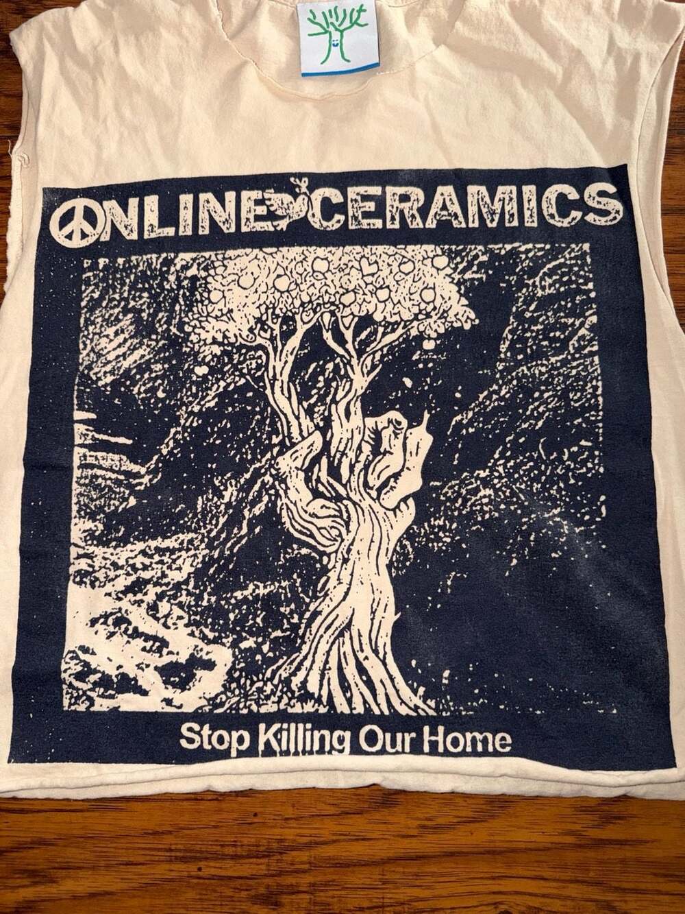 Online Ceramics Stop Killing Our Home Cut Off Sleeves Graphic T Shirt - Picture 2 of 7